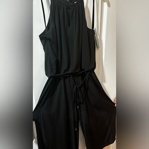 Black romper with string at waist line